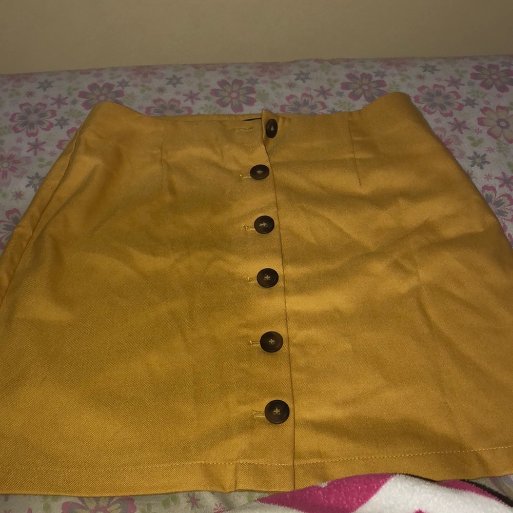 yellow buttoned skirt